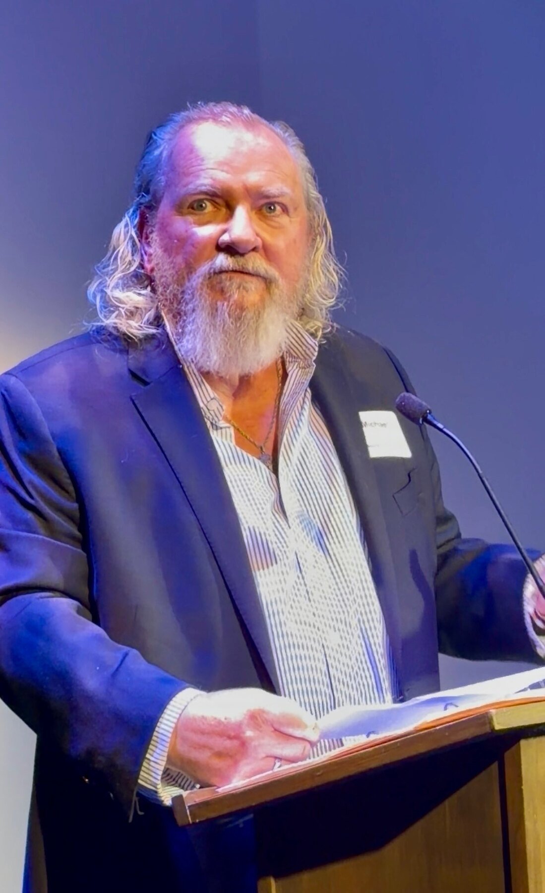 Michael Daly speaking at a community event