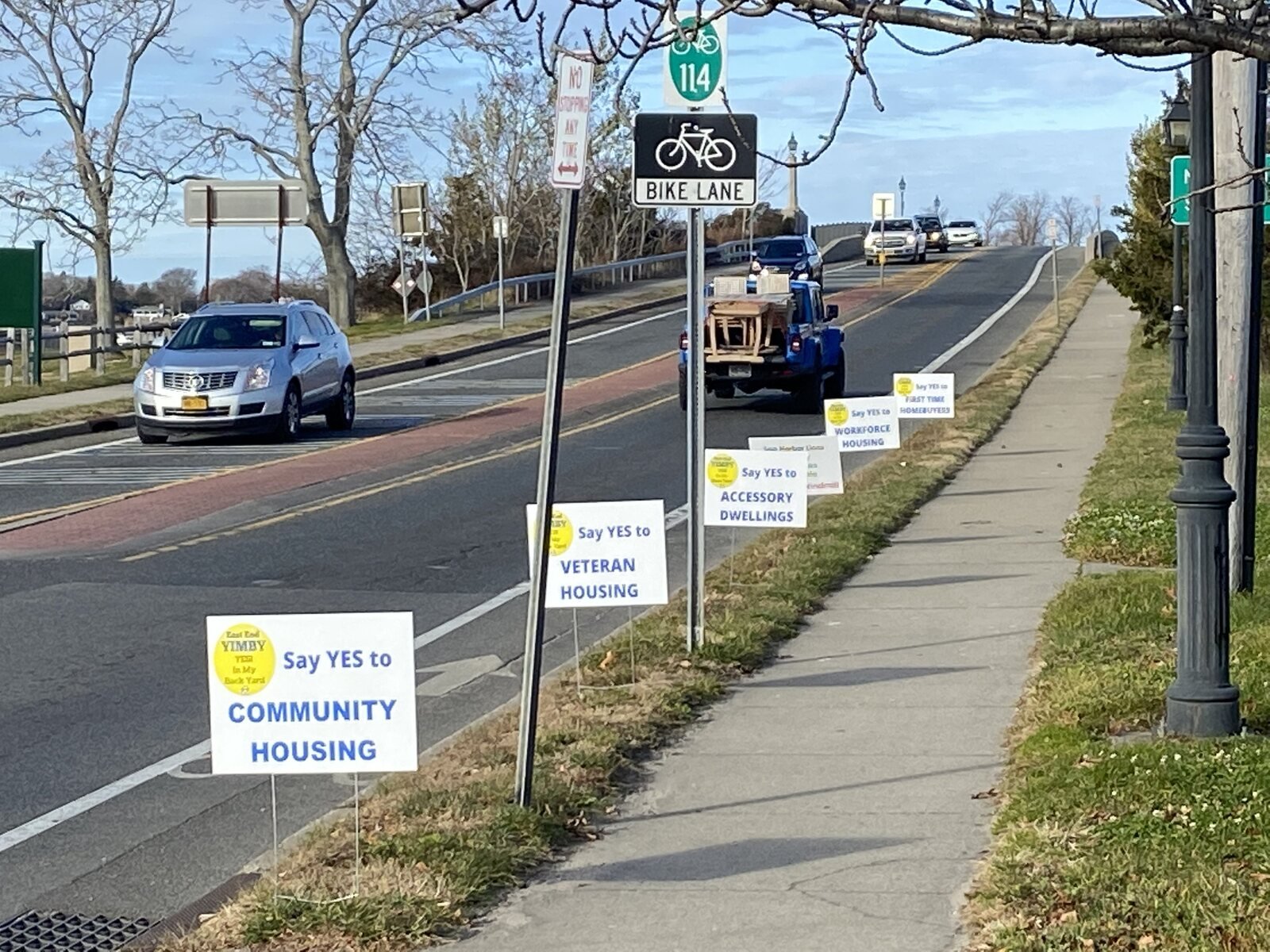 East End YIMBY community housing signs along an East End roadway